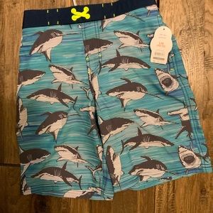 Wonder Nation boys shark swim trunks. Size large. NWT